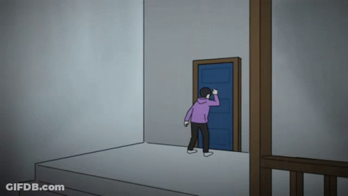 A Man In A Purple Hoodie Is Standing In Front Of A Door GIF