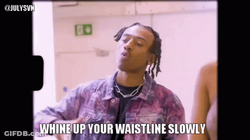 A Man In A Purple Jacket Is Whine Up Your Waistline Slowly In A Video . GIF