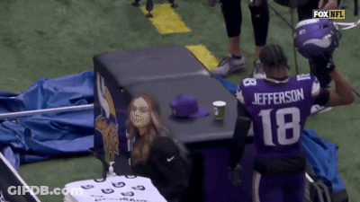 A Man In A Purple Jersey That Says Jefferson 18 GIF
