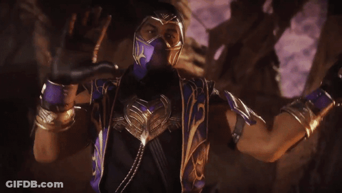 A Man In A Purple Mask Is Holding A Purple Weapon With The Letter M On It GIF