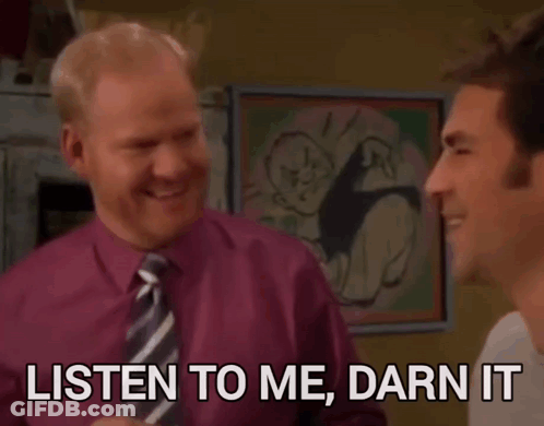 A Man In A Purple Shirt And Tie Is Talking To Another Man Who Says Listen To Me Darn It GIF