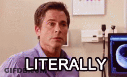 A Man In A Purple Shirt Is Sitting In Front Of A Computer With The Word Literally Written On It . GIF