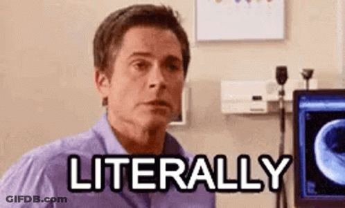 A Man In A Purple Shirt Is Sitting In Front Of A Computer With The Words `` Literally '' Written On The Screen . GIF