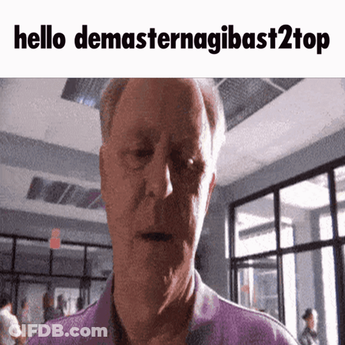 A Man In A Purple Shirt Says Hello Demasternagibast2top In Front Of A Building GIF