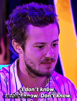 A Man In A Purple Shirt Says " I Don 'T Know I Don 'T Know " GIF