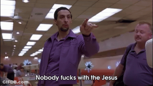 A Man In A Purple Shirt Says Nobody Fucks With Jesus GIF