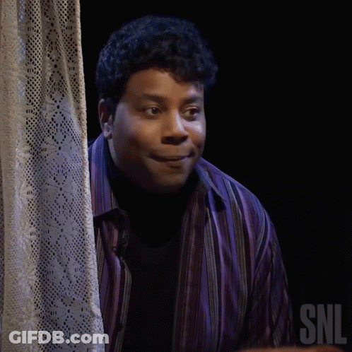 A Man In A Purple Shirt Says Nope In Front Of A Curtain GIF