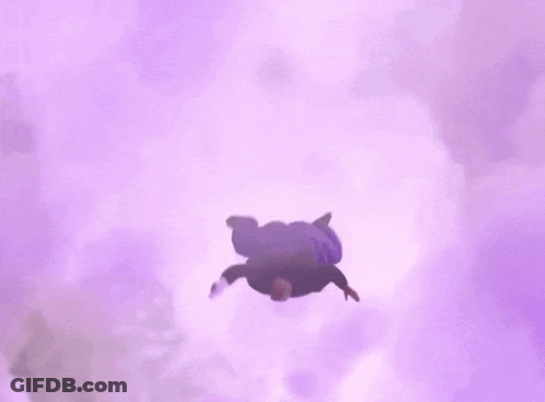A Man In A Purple Shirt With The Letter A On It Is Jumping In The Air GIF