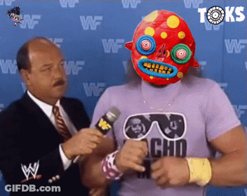 A Man In A Purple Shirt With The Word Choo On It Is Talking Into A Microphone GIF