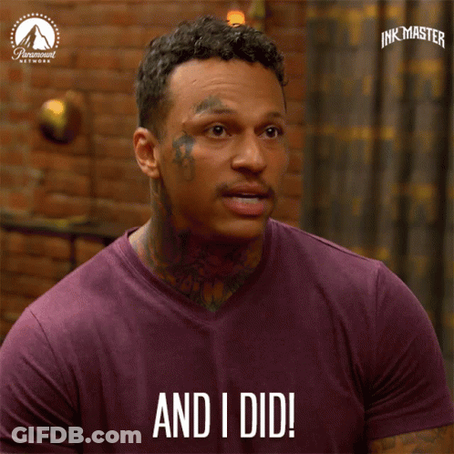 A Man In A Purple Shirt With The Words And I Did On His Shirt GIF
