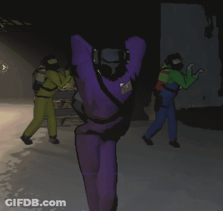 A Man In A Purple Suit Has A Name Tag On His Back That Says " Scuba " GIF