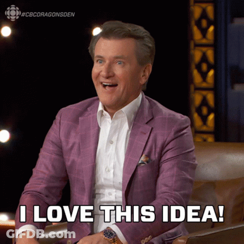 A Man In A Purple Suit Is Sitting In A Chair And Says I Love This Idea GIF