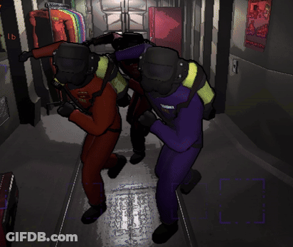 A Man In A Purple Suit Is Standing Next To Another Man In A Red Suit In A Hallway GIF
