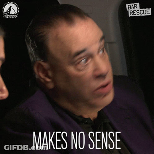 Man In Purple Suit Says Makes No Sense GIF