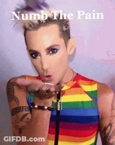 A Man In A Rainbow Shirt Blowing A Kiss With The Words Numb The Pain Below Him GIF