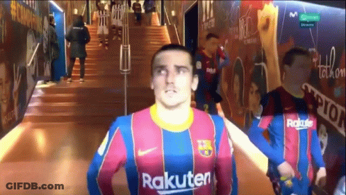 A Man In A Rakuten Jersey Is Standing In A Hallway GIF