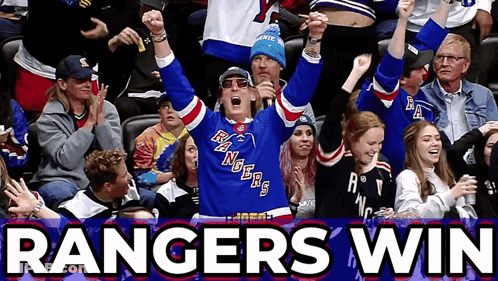 A Man In A Rangers Jersey Stands In A Crowd GIF