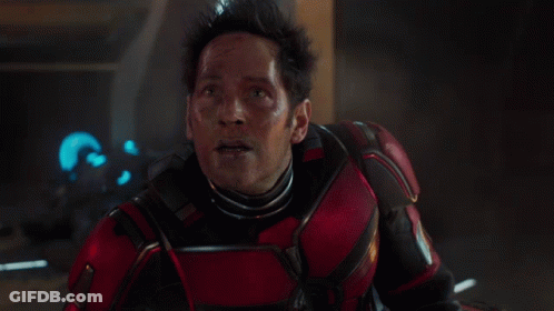 Man In Red And Black Armor Looking Up GIF