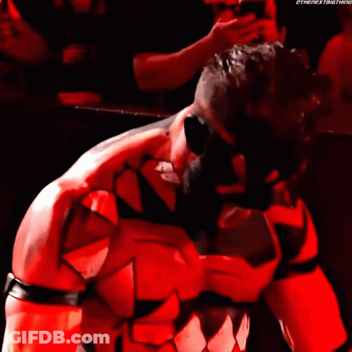 A Man In A Red And Black Costume With The Word Ethe Next Thing On The Bottom GIF