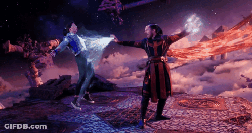 A Man In A Red And Black Robe Is Standing Next To A Man In A Blue And White Shirt GIF