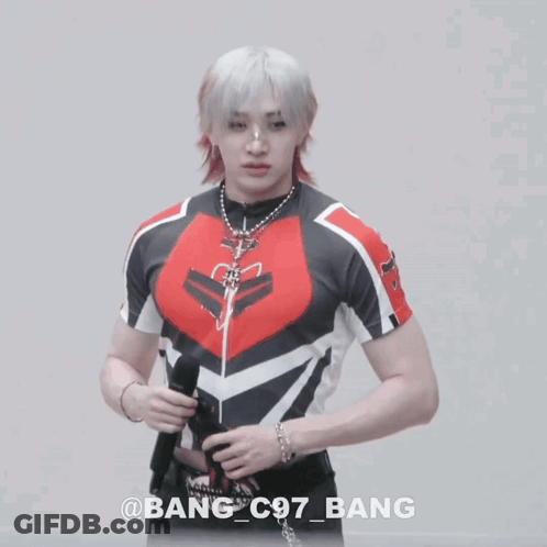 A Man In A Red And Black Shirt Has The Name Bang On The Bottom GIF