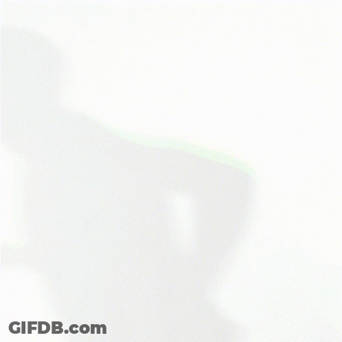 A Man In A Red And Black Shirt Is Running GIF