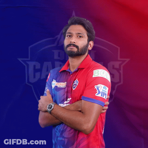 A Man In A Red And Blue Shirt With The Word Ipl On His Arm GIF