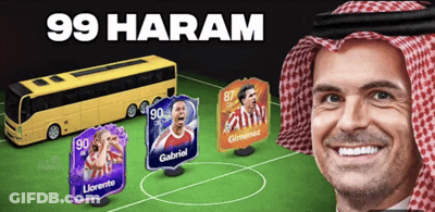 A Man In A Red And White Head Scarf Is Smiling In Front Of A Soccer Field GIF