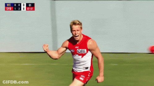 A Man In A Red And White Jersey With The Word Sydney On It Is Running On A Field GIF