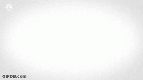 A Man In A Red And White Red Bull Jersey GIF