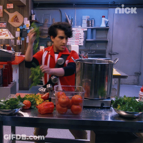 A Man In A Red And White Uniform Is Preparing Food In A Kitchen With A Sign That Says Nick On It GIF