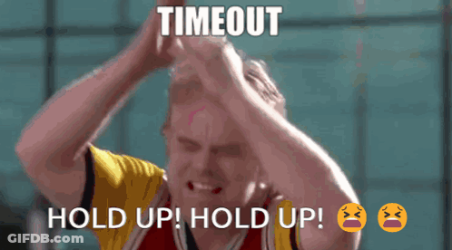A Man In A Red And Yellow Jersey Says Hold Up GIF