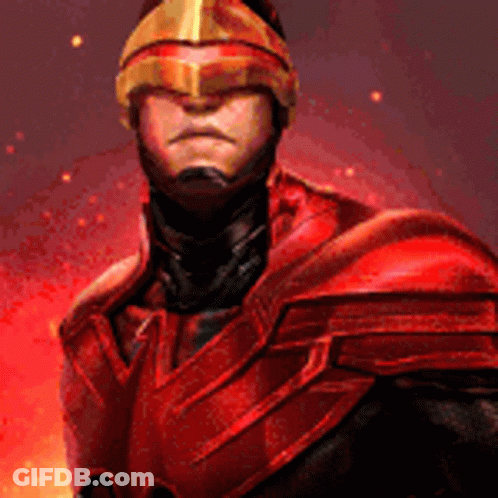 A Man In A Red Armor And Helmet Is Standing In Front Of A Fireball . GIF