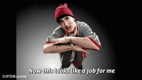 A Man In A Red Beanie Is Squatting Down With The Words Now This Looks Like A Job For Me Below Him GIF