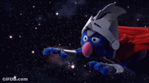 A Man In A Red Cape Is Flying Through Space In Front Of A Large Asteroid GIF