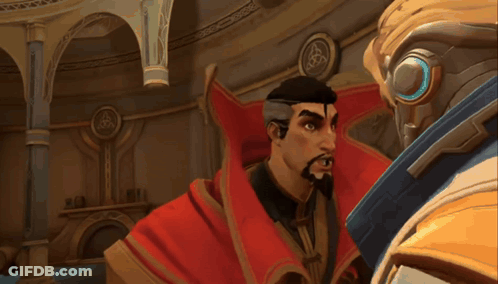 A Man In A Red Cape Is Talking To Another Man In A Suit GIF