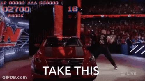 A Man In A Red Car Says Take This GIF
