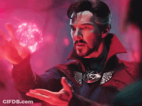 A Man In A Red Coat Is Holding A Red Object GIF