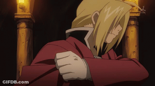 A Man In A Red Coat Is Standing In Front Of A Pillar With A Tbs Logo In The Background GIF