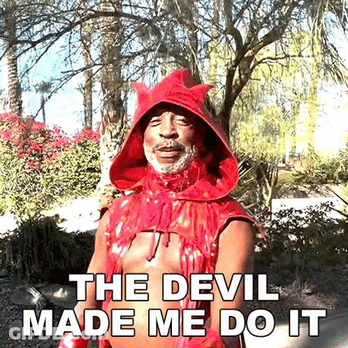A Man In A Red Devil Costume With The Words The Devil Made Me Do It Below Him GIF