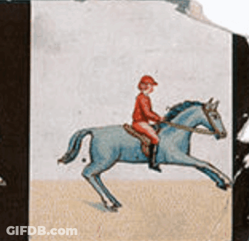 A Man In A Red Hat Is Riding A Horse GIF