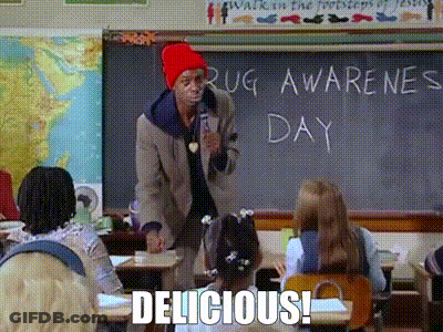 A Man In A Red Hat Is Standing In Front Of A Blackboard With The Words Drug Awareness Day Written On It GIF