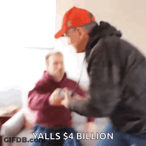 A Man In A Red Hat Says Yalls $ 4 Billion In Front Of Another Man GIF