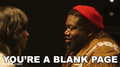 A Man In A Red Hat Says " You 'Re A Blank Page " In Front Of A Woman GIF