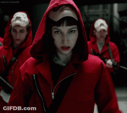 A Man In A Red Hooded Jacket Has A Mustache On His Face And A White Glove On His Hand GIF
