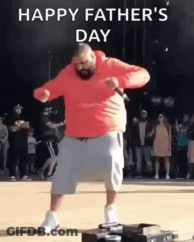 A Man In A Red Hoodie And Shorts Is Dancing In Front Of A Crowd On Father 'S Day . GIF
