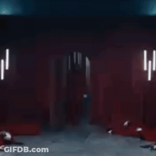 A Man In A Red Hoodie Is Kissing Another Man GIF