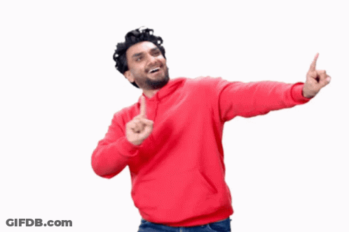 A Man In A Red Hoodie Is Pointing Up With His Fingers GIF