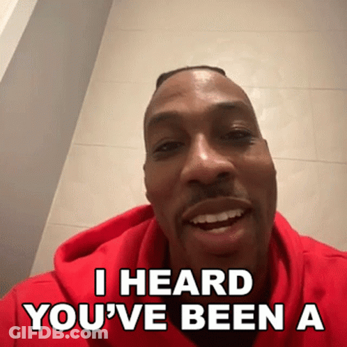 A Man In A Red Hoodie Is Smiling And Saying I Heard You 'Ve Been A GIF