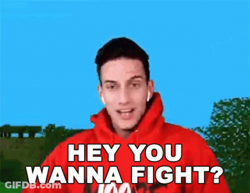 A Man In A Red Hoodie Says " Hey You Wanna Fight ? " GIF